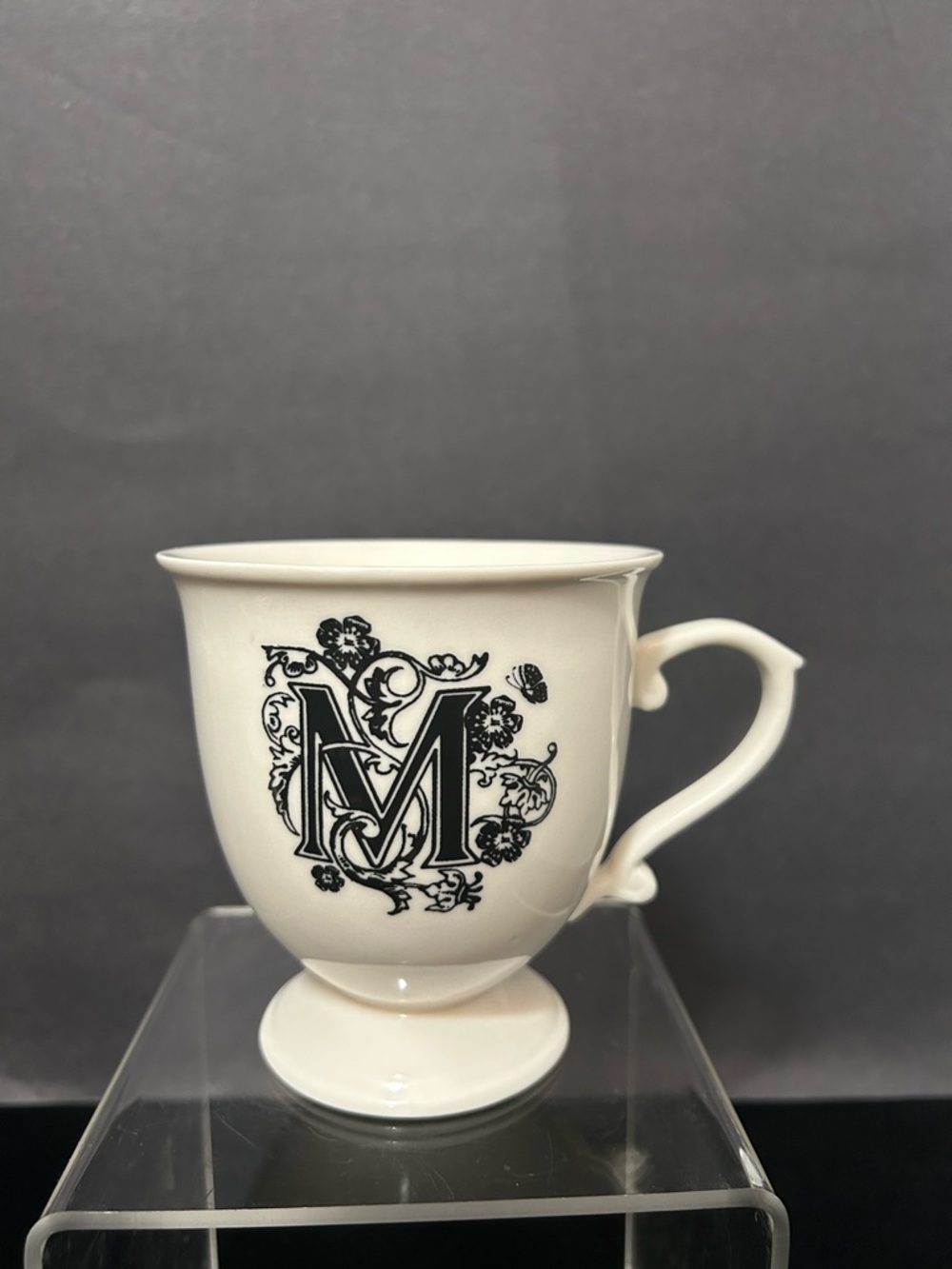 Anthropologie Cream and Black 'M' Floral Pedestal Mug